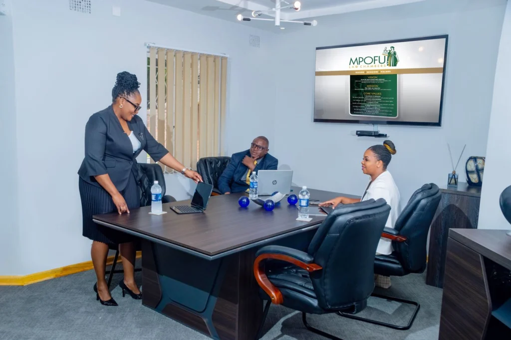 The Managing Partner leading a boardroom meeting