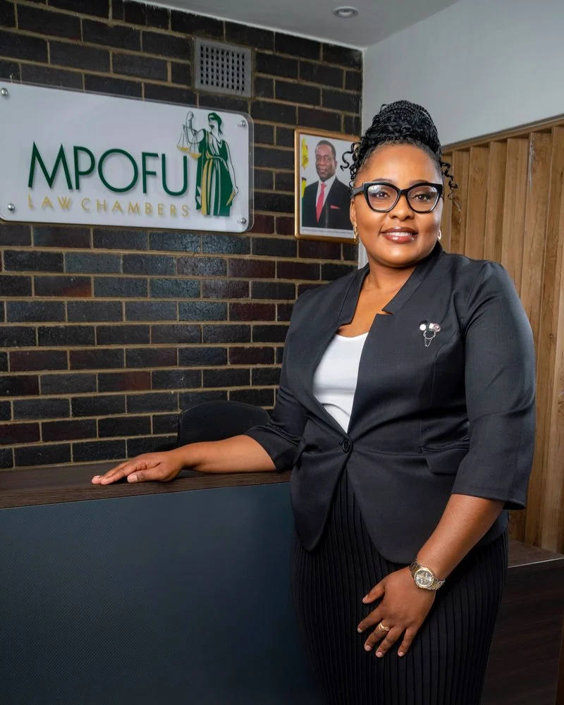 Dudzai Annah Mpofu, Managing Partner, standing at the Mpofu Law Chambers reception