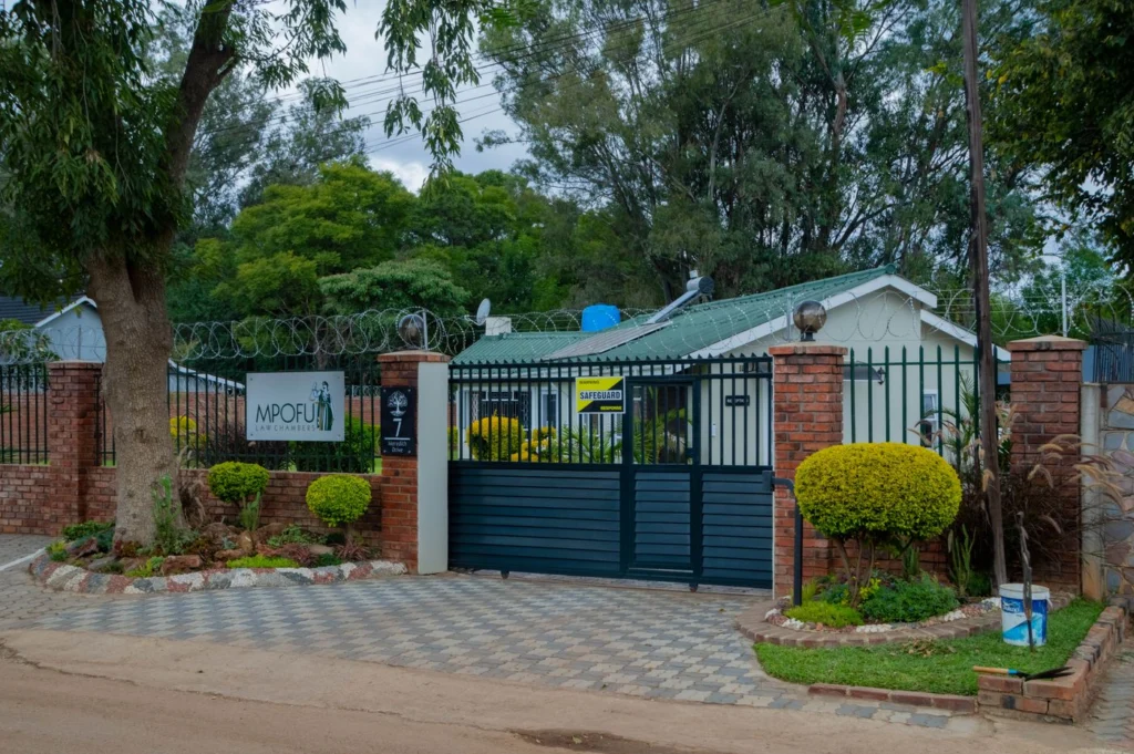 The gated entrance to Mpofu Law Chambers at 7 Meredith Drive, Eastlea